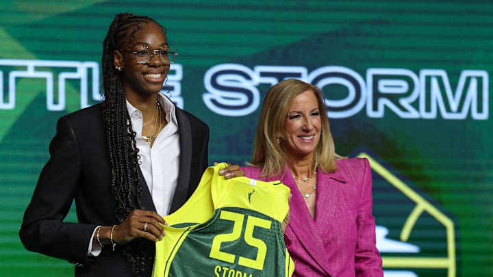 Dominique Malonga of France,  with WNBA commissioner Cathy Engelbert,  is part of a trend towards more non-NCAA international players being selected at the top of the draft. 