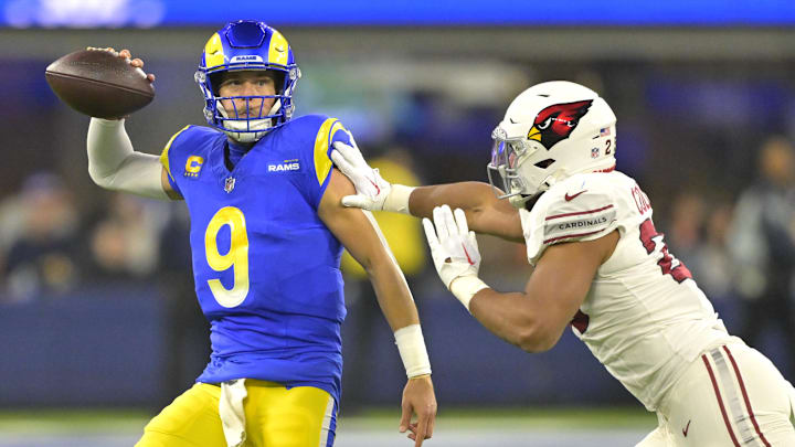 Dec 28, 2024; Inglewood, California, USA; Los Angeles Rams quarterback Matthew Stafford (9) throws an incomplete pass as he is pressured by Arizona Cardinals cornerback Sean Murphy-Bunting (23) in the first half at SoFi Stadium. Mandatory Credit: Jayne Kamin-Oncea-Imagn Images Dec 28, 2024; Inglewood, California, USA; Los Angeles Rams quarterback Matthew Stafford (9) throws an incomplete pass as he is pressured by Arizona Cardinals cornerback Sean Murphy-Bunting (23) in the first half at SoFi Stadium. Mandatory Credit: Jayne Kamin-Oncea-Imagn Images
