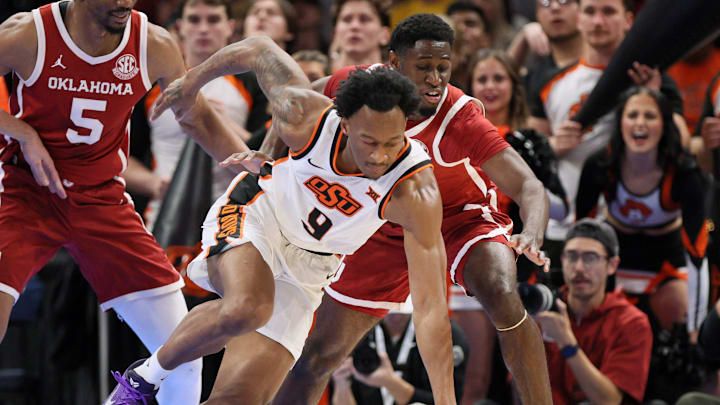 Oklahoma State guard Anthony Roy (9) chases the ball in front of Oklahoma guard Jadon Jones during the first half of a Bedlam men's college basketball game between the OSU Cowboys and OU Sooners at Paycom Center in Oklahoma City, Saturday, Dec. 13, 2025. Oklahoma State guard Anthony Roy (9) chases the ball in front of Oklahoma guard Jadon Jones during the first half of a Bedlam men's college basketball game between the OSU Cowboys and OU Sooners at Paycom Center in Oklahoma City, Saturday, Dec. 13, 2025.