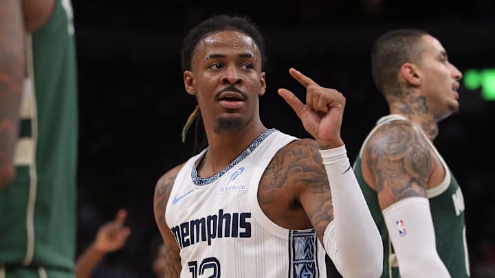 Dec 26, 2025; Memphis, Tennessee, USA; Memphis Grizzlies guard Ja Morant (12) gestures during the third quarter against the Milwaukee Bucks at FedExForum.