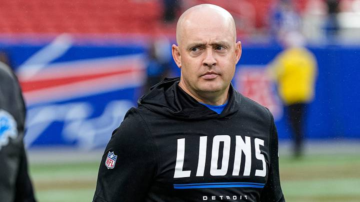 Detroit Lions offensive coordinator Drew Petzing watches warm up ahead of the game between Detroit Lions and Buffalo Bills at Highmark Stadium in Orchard Park, N.Y., on Thursday, Sept. 17, 2026.
