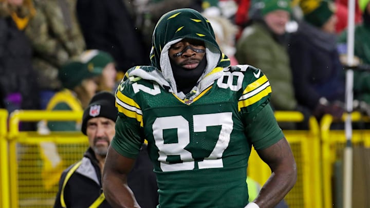 Green Bay Packers wide receiver Romeo Doubs (87) leaves the field after getting injured on a pass interference play commited by San Francisco 49ers cornerback Renardo Green (0) in the third quarter during their football game Sunday, November 24, 2024, at Lambeau Field in Green Bay, Wisconsin.