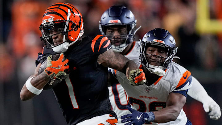 Cincinnati Bengals wide receiver Ja'Marr Chase (1) breaks away with a reception in the fourth quarter of the NFL Week 17 game between the Cincinnati Bengals and the Denver Broncos at Paycor Stadium in downtown Cincinnati on Saturday, Dec. 28, 2024. The Bengals took a 30-24 win in overtime to remain in the post season chase.