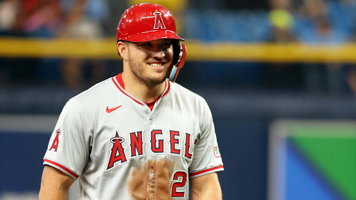 Apr 16, 2024; St. Petersburg, Florida, USA; Los Angeles Angels outfielder Mike Trout (27) smiles at the end of the first inning against the Tampa Bay Rays at Tropicana Field. Mandatory Credit: Kim Klement Neitzel-Imagn Images