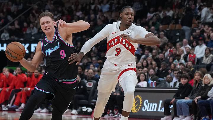 Apr 7, 2026; Toronto, Ontario, CAN; Miami Heat guard Pelle Larsson (9) controls the ball as Toronto Raptors forward RJ Barrett (9) tries to defend during the first quarter at Scotiabank Arena. Mandatory Credit: Nick Turchiaro-Imagn Images Apr 7, 2026; Toronto, Ontario, CAN; Miami Heat guard Pelle Larsson (9) controls the ball as Toronto Raptors forward RJ Barrett (9) tries to defend during the first quarter at Scotiabank Arena. Mandatory Credit: Nick Turchiaro-Imagn Images