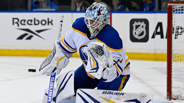Apr 8, 2026; New York, New York, USA; Buffalo Sabres goaltender Ukko-Pekka Luukkonen (1) makes a glove save against the New York Rangers during the second period at Madison Square Garden. Mandatory Credit: Dennis Schneidler-Imagn Images
