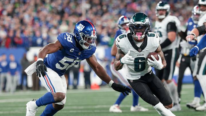Philadelphia Eagles wide receiver DeVonta Smith (6) carries the ball defended by New York Giants linebacker Bobby Okereke Philadelphia Eagles wide receiver DeVonta Smith (6) carries the ball defended by New York Giants linebacker Bobby Okereke