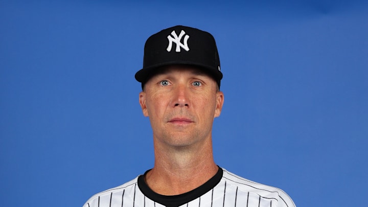 Feb 18, 2025; Tampa, FL, USA; New York Yankees first base/infield coach Travis Chapman (75) poses for a portrait during the  Photo Day at George M. Steinbrenner Field. Mandatory Credit: New York Yankees via Imagn Images