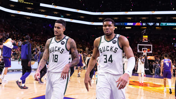 Mar 24, 2025; Phoenix, Arizona, USA; Milwaukee Bucks forward Kyle Kuzma (18) and forward Giannis Antetokounmpo (34) against the Phoenix Suns at Footprint Center. Mandatory Credit: Mark J. Rebilas-Imagn Images