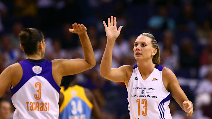Sep 9, 2014; Phoenix, AZ, USA; Phoenix Mercury forward Penny Taylor (13) celebrates a play with guard Diana Taurasi (3) against the Chicago Sky during game two of the WNBA Finals at US Airways Center. Mandatory Credit: Mark J. Rebilas-Imagn Images
