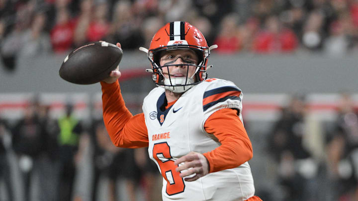 Oct 12, 2024; Raleigh, North Carolina, USA;  Syracuse Orange quarter back Kyle McCord (6) winds up for a pass at Carter-Finley Stadium during the first half. Mandatory Credit: Zachary Taft-Imagn Images
