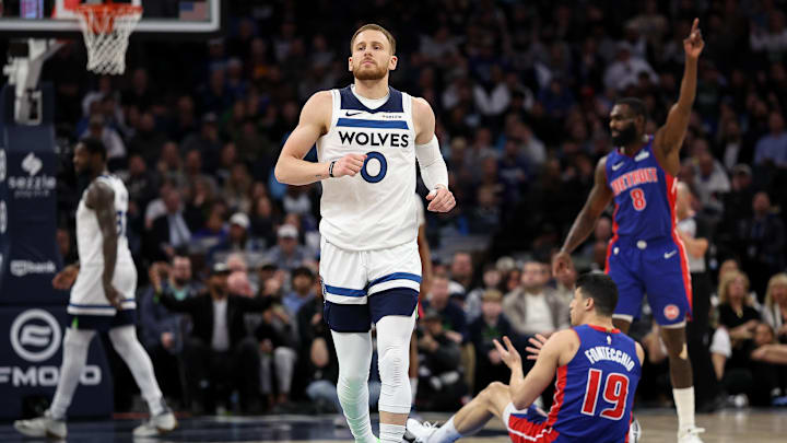 Minnesota Timberwolves guard Donte DiVincenzo (0) looks on during the first quarter against the Detroit Pistons Minnesota Timberwolves guard Donte DiVincenzo (0) looks on during the first quarter against the Detroit Pistons