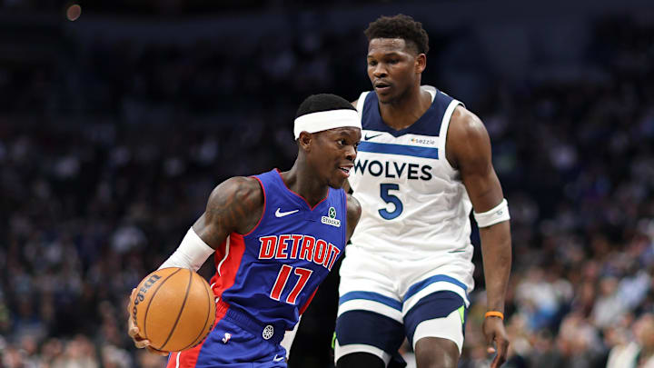 Mar 30, 2025; Minneapolis, Minnesota, USA; Detroit Pistons guard Dennis Schroder (17) works around Minnesota Timberwolves guard Anthony Edwards (5) during the first quarter at Target Center. Mandatory Credit: Matt Krohn-Imagn Images