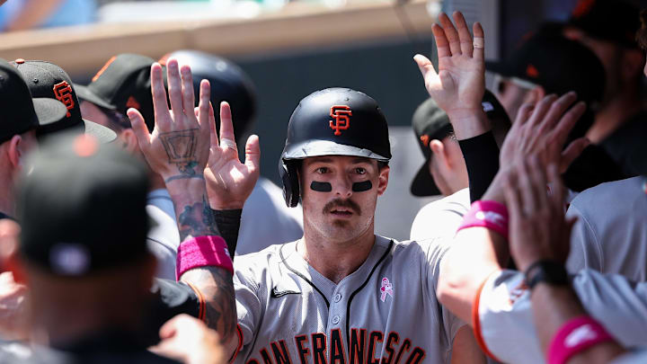 May 11, 2025; Minneapolis, Minnesota, USA; San Francisco Giants right fielder Mike Yastrzemski (5) celebrates after scoring on a sacrifice fly hit by left fielder Heliot Ramos (17)during the first inning against the Minnesota Twins at Target Field. May 11, 2025; Minneapolis, Minnesota, USA; San Francisco Giants right fielder Mike Yastrzemski (5) celebrates after scoring on a sacrifice fly hit by left fielder Heliot Ramos (17)during the first inning against the Minnesota Twins at Target Field.