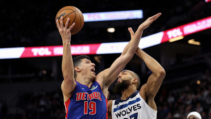 Mar 30, 2025; Minneapolis, Minnesota, USA; Detroit Pistons forward Simone Fontecchio (19) shoots the ball as Minnesota Timberwolves center Rudy Gobert (27) defends during the second quarter at Target Center. Mandatory Credit: Matt Krohn-Imagn Images Mar 30, 2025; Minneapolis, Minnesota, USA; Detroit Pistons forward Simone Fontecchio (19) shoots the ball as Minnesota Timberwolves center Rudy Gobert (27) defends during the second quarter at Target Center. Mandatory Credit: Matt Krohn-Imagn Images