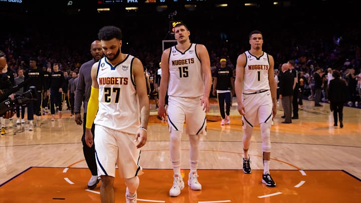 May 7, 2023; Phoenix, Arizona, USA; Denver Nuggets guard Jamal Murray (27), center Nikola Jokic (15) and forward Michael Porter Jr. (1) react against the Phoenix Suns during game four of the 2023 NBA playoffs at Footprint Center. Mandatory Credit: Mark J. Rebilas-Imagn Images