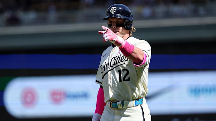 May 11, 2025; Minneapolis, Minnesota, USA; Minnesota Twins left fielder Harrison Bader (12) celebrates his RBI single against the San Francisco Giants during the sixth inning at Target Field. Mandatory Credit: Matt Krohn-Imagn Images