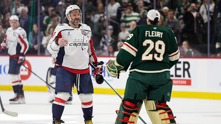 Alex Ovechkin and Marc-Andre Fleury prepare to shake hands.