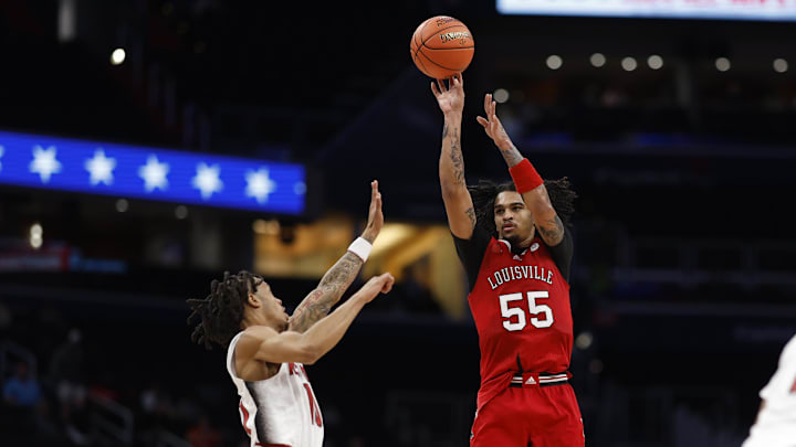 Mar 12, 2024; Washington, D.C., USA; Louisville Cardinals guard Skyy Clark (55) shoots the ball over