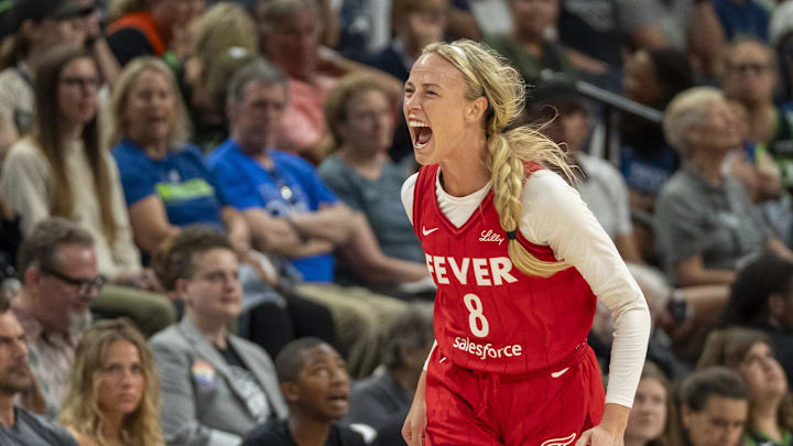 Jul 1, 2025; Minneapolis, Minnesota, USA; Indiana Fever guard Sophie Cunningham (8) celebrates after making a three point shot against the Minnesota Lynx in the second half during the Commissioner's Cup final at Target Center. Mandatory Credit: Jesse Johnson-Imagn Images