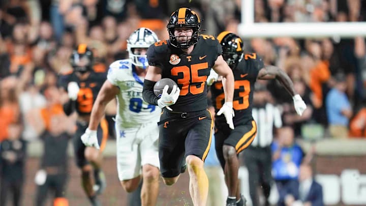 Nov 2, 2024; Knoxville, Tennessee, USA; Tennessee Volunteers defensive back Will Brooks (35) runs after intercepting a pass against the Kentucky Wildcats during the second half at Neyland Stadium. Mandatory Credit: Caitie McMekin/USA TODAY Network via Imagn Images
