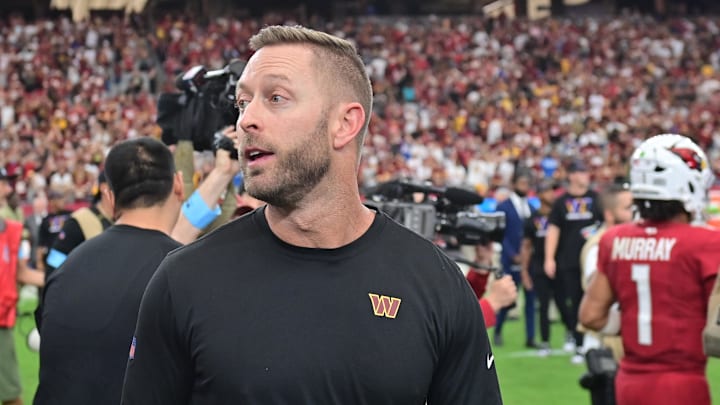 Sep 29, 2024; Glendale, Arizona, USA;  Washington Commanders offensive coordinator Kliff Kingsbury reacts after beating the Arizona Cardinals at State Farm Stadium. Mandatory Credit: Matt Kartozian-Imagn Images