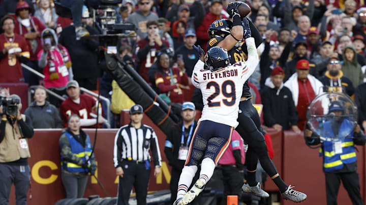 TE Zach Ertz tries to beat Bears CB Tyrique Stevenson for a TD Sunday but can't hold onto the ball when he hits the turf.