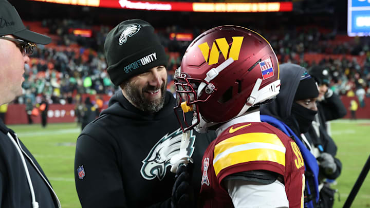 Dec 20, 2025; Landover, Maryland, USA; Philadelphia Eagles head coach Nick Sirianni greets Washington Commanders cornerback Mike Sainristil (0) after the game at Northwest Stadium. Mandatory Credit: Geoff Burke-Imagn Images