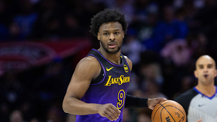 Jan 28, 2025; Philadelphia, Pennsylvania, USA; Los Angeles Lakers guard Bronny James (9) controls the ball against the Philadelphia 76ers at Wells Fargo Center. Mandatory Credit: Bill Streicher-Imagn Images