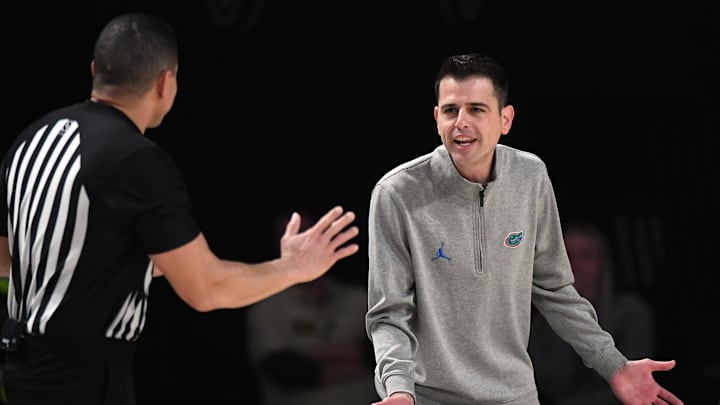 Mar 9, 2024; Nashville, Tennessee, USA; Florida Gators head coach Todd Golden questions a call by