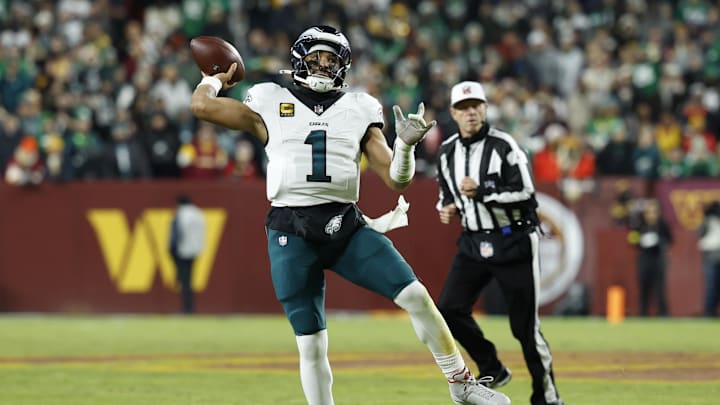 Dec 20, 2025; Landover, Maryland, USA; Philadelphia Eagles quarterback Jalen Hurts (1) passes against the Washington Commanders in the second half at Northwest Stadium. 