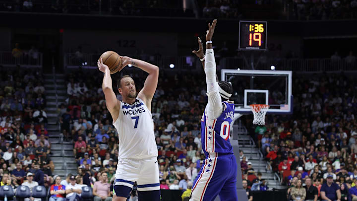 Oct 11, 2024; Des Moines, Iowa, USA; Philadelphia 76ers guard Reggie Jackson (00) defends Minnesota Timberwolves guard Joe Ingles (7) at Wells Fargo Arena. The Timberwolves beat the 76ers 121 to 111. Mandatory Credit: Reese Strickland-Imagn Images Oct 11, 2024; Des Moines, Iowa, USA; Philadelphia 76ers guard Reggie Jackson (00) defends Minnesota Timberwolves guard Joe Ingles (7) at Wells Fargo Arena. The Timberwolves beat the 76ers 121 to 111. Mandatory Credit: Reese Strickland-Imagn Images