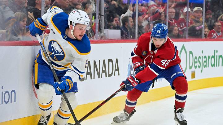 Buffalo Sabres forward Zach Benson (6) and Montreal Canadiens defenseman Lane Hutson (48) battle for the puck during the second period at the Bell Centre. Mandatory Credit: Eric Bolte-Imagn Images Buffalo Sabres forward Zach Benson (6) and Montreal Canadiens defenseman Lane Hutson (48) battle for the puck during the second period at the Bell Centre. Mandatory Credit: Eric Bolte-Imagn Images