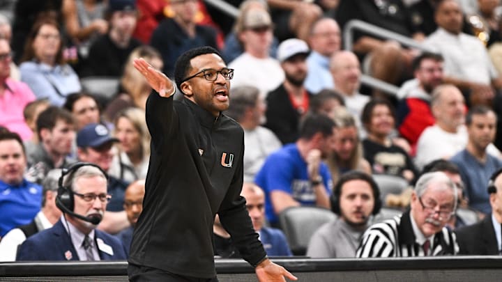 Mar 22, 2026; St. Louis, MO, USA; Miami Hurricanes head coach Jai Lucas calls a play during the first half against the Purdue Boilermakers during a second round game of the men's 2026 NCAA Tournament at Enterprise Center. Mandatory Credit: Jeff Le-Imagn Images Mar 22, 2026; St. Louis, MO, USA; Miami Hurricanes head coach Jai Lucas calls a play during the first half against the Purdue Boilermakers during a second round game of the men's 2026 NCAA Tournament at Enterprise Center. Mandatory Credit: Jeff Le-Imagn Images