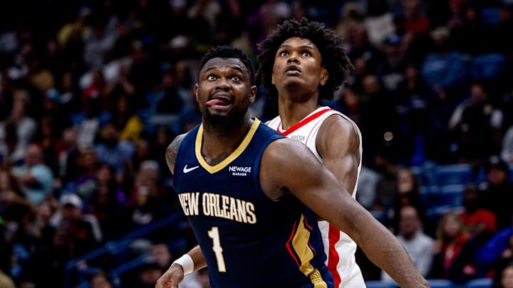Mar 6, 2025; New Orleans, Louisiana, USA;  New Orleans Pelicans forward Zion Williamson (1) and Houston Rockets forward Amen Thompson (1) fight for position on a free throw during the second half at Smoothie King Center. Mandatory Credit: Stephen Lew-Imagn Images