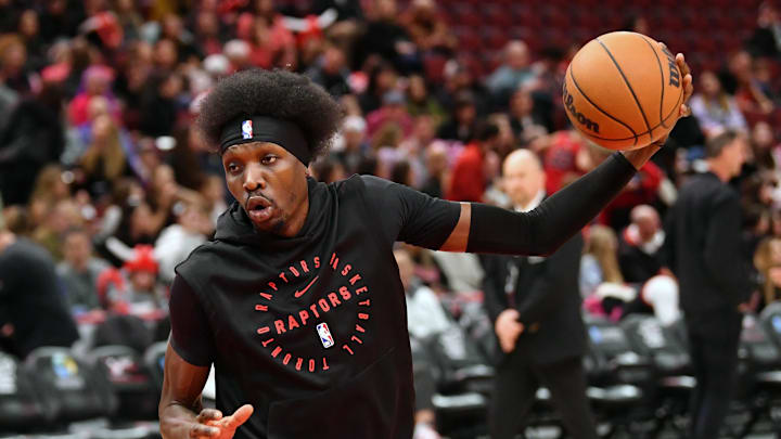 Feb 28, 2025; Chicago, Illinois, USA; Toronto Raptors forward Chris Boucher (25) warms up prior to a game against the Chicago Bulls at the United Center. Mandatory Credit: Patrick Gorski-Imagn Images