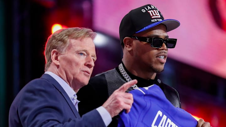 NFL Commissioner points out New York Giants fans to edge rusher Abdul Carter after the Giants select Carter with the third pick during the first round of the 2025 NFL Draft on Thursday, April 24, 2025, at Lambeau Field in Green Bay, Wisconsin. The draft runs through April 26. 