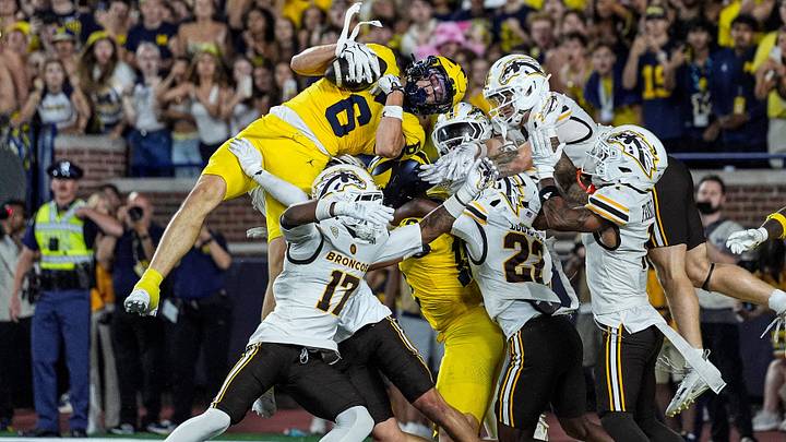 Michigan wide receiver JJ Buchanan (6) catches a 47-yard touchdown on a Hail Mary against Western Michigan to win, 13-12, as time expires in the fourth quarter at Michigan Stadium in Ann Arbor on Saturday, Sept. 5, 2026. Michigan wide receiver JJ Buchanan (6) catches a 47-yard touchdown on a Hail Mary against Western Michigan to win, 13-12, as time expires in the fourth quarter at Michigan Stadium in Ann Arbor on Saturday, Sept. 5, 2026.
