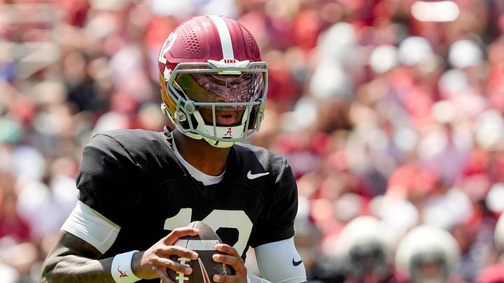 April 11, 2026; Tuscaloosa, AL, USA; Alabama quarterback Keelon Russell rolls out and throws a touchdown pass at Bryant-Denny Stadium during the Alabama A Day scrimmage. April 11, 2026; Tuscaloosa, AL, USA; Alabama quarterback Keelon Russell rolls out and throws a touchdown pass at Bryant-Denny Stadium during the Alabama A Day scrimmage.