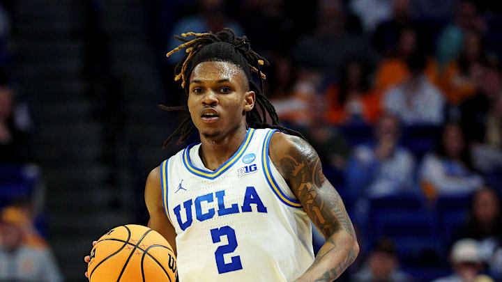Mar 20, 2025; Lexington, KY, USA;  UCLA Bruins guard Dylan Andrews (2) brings the ball up court during the second half against the Utah State Aggies in the first round of the NCAA Tournament at Rupp Arena. Mandatory Credit: Jordan Prather-Imagn Images