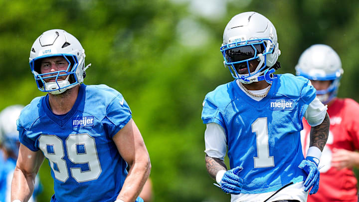 Detroit Lions wide receiver Jameson Williams (1), center, and tight end Brock Wright (89) practice during OTA at Meijer Performance Center in Allen Park on Friday, May 30, 2025.