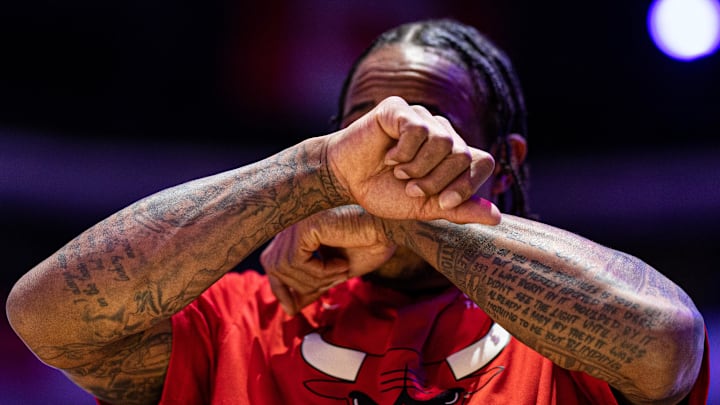 Mar 20, 2023; Philadelphia, Pennsylvania, USA; Chicago Bulls forward DeMar DeRozan (11) during the anthem before action against the Philadelphia 76ers at Wells Fargo Center. Mandatory Credit: Bill Streicher-USA TODAY Sports