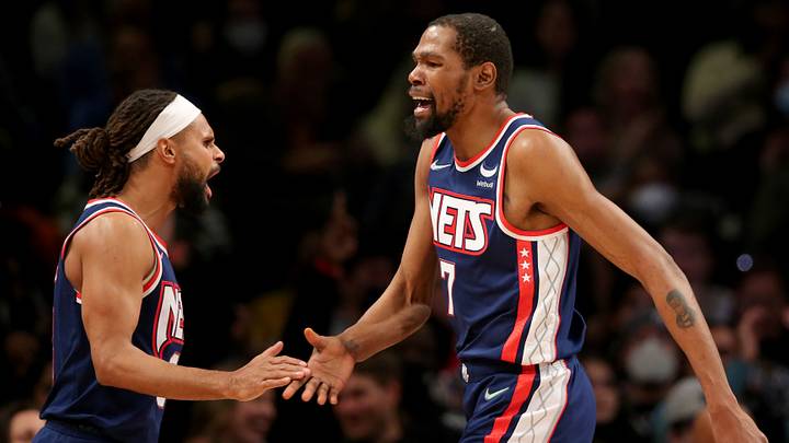 Dec 3, 2021; Brooklyn, New York, USA; Brooklyn Nets forward Kevin Durant (7) celebrates with guard Patty Mills (8) during the second quarter against the Minnesota Timberwolves at Barclays Center. Mandatory Credit: Brad Penner-USA TODAY Sports Dec 3, 2021; Brooklyn, New York, USA; Brooklyn Nets forward Kevin Durant (7) celebrates with guard Patty Mills (8) during the second quarter against the Minnesota Timberwolves at Barclays Center. Mandatory Credit: Brad Penner-USA TODAY Sports