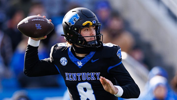 Nov 30, 2024; Lexington, Kentucky, USA; Kentucky Wildcats quarterback Cutter Boley (8) throws a pass during the first quarter against the Louisville Cardinals at Kroger Field. Mandatory Credit: Jordan Prather-Imagn Images