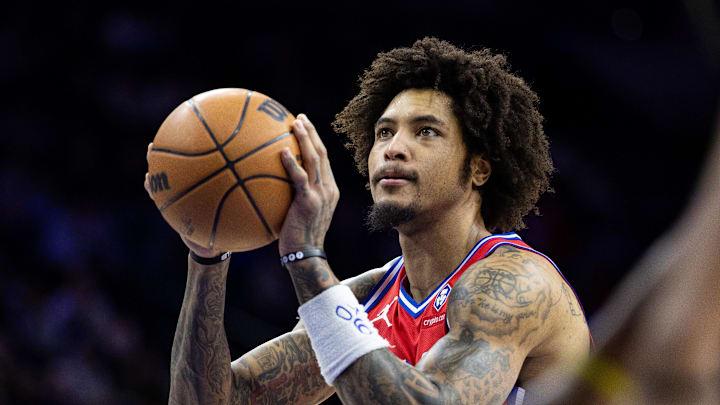 Jan 24, 2025; Philadelphia, Pennsylvania, USA; Philadelphia 76ers guard Kelly Oubre Jr. (9) shoots a foul shot against the Cleveland Cavaliers during the first quarter at Wells Fargo Center. Mandatory Credit: Bill Streicher-Imagn Images