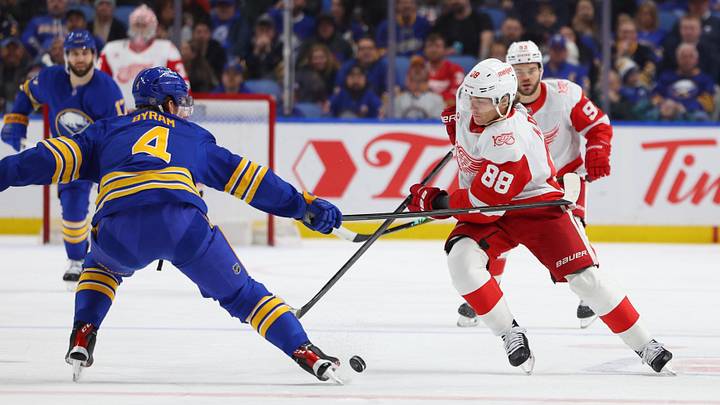 Mar 27, 2026; Buffalo, New York, USA; Detroit Red Wings right wing Patrick Kane (88) tries to control the puck as Buffalo Sabres defenseman Bowen Byram (4) defends during the first period at KeyBank Center. Mandatory Credit: Timothy T. Ludwig-Imagn Images Mar 27, 2026; Buffalo, New York, USA; Detroit Red Wings right wing Patrick Kane (88) tries to control the puck as Buffalo Sabres defenseman Bowen Byram (4) defends during the first period at KeyBank Center. Mandatory Credit: Timothy T. Ludwig-Imagn Images