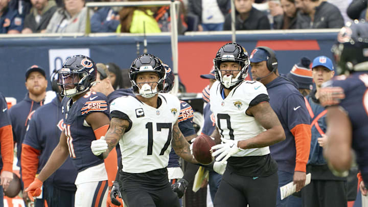 Oct 13, 2024; London, United Kingdom; Jacksonville Jaguars wide receiver Gabe Davis (0) and Jacksonville Jaguars tight end Evan Engram (17) react during the second half of an NFL International Series game at Tottenham Hotspur Stadium. Mandatory Credit: Peter van den Berg-Imagn Images