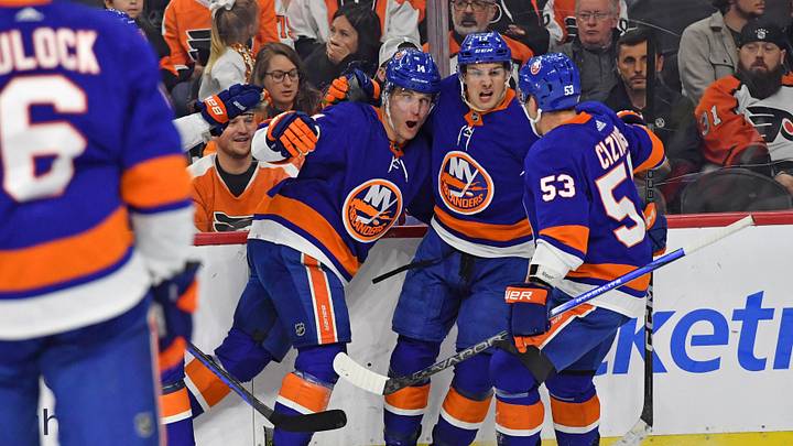 Apr 1, 2024; Philadelphia, Pennsylvania, USA; New York Islanders center Bo Horvat (14) celebrates his goal with  center Mathew Barzal (13) and center Casey Cizikas (53) against the Philadelphia Flyers during the first period at Wells Fargo Center. Mandatory Credit: Eric Hartline-USA TODAY Sports