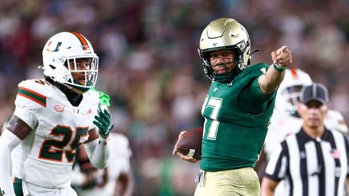 Sep 21, 2024; Tampa, Florida, USA; South Florida Bulls quarterback Byrum Brown (17) reacts after a play against the Miami Hurricanes in the third quarter  at Raymond James Stadium. Mandatory Credit: Nathan Ray Seebeck-Imagn Images