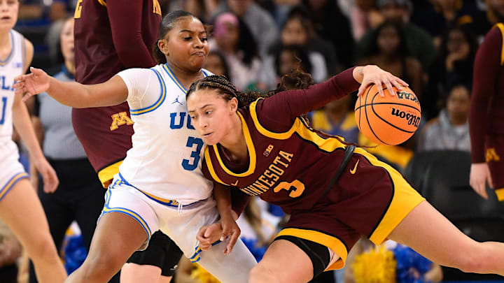 Feb 2, 2025; Los Angeles, California, USA; Minnesota Golden Gophers guard Amaya Battle (3) tries to dribble past UCLA Bruins guard Londynn Jones (3) during the third quarter at Pauley Pavilion presented by Wescom. Mandatory Credit: Robert Hanashiro-Imagn Images